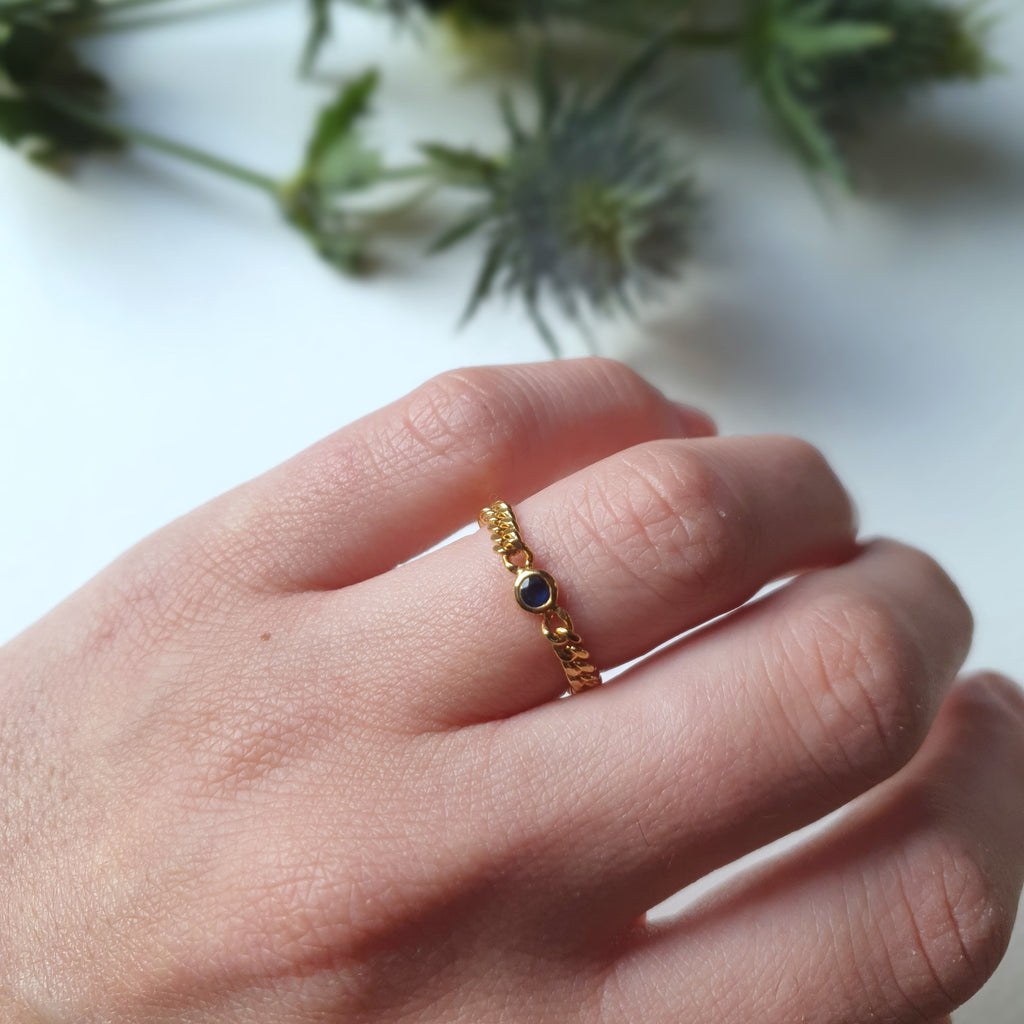 Sapphire and gold chain ring. Sustainably made using ethically sourced gemstones.